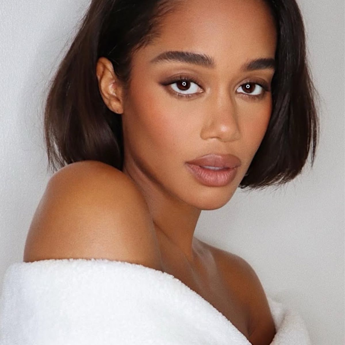 An image of Laura Harrier with bronzed makeup by celebrity makeup artist Hung Vanngo.