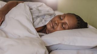 A woman asleep in bed