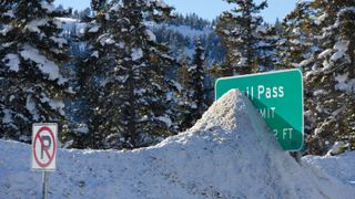 Vail Pass Summit Sign Buried in Snow