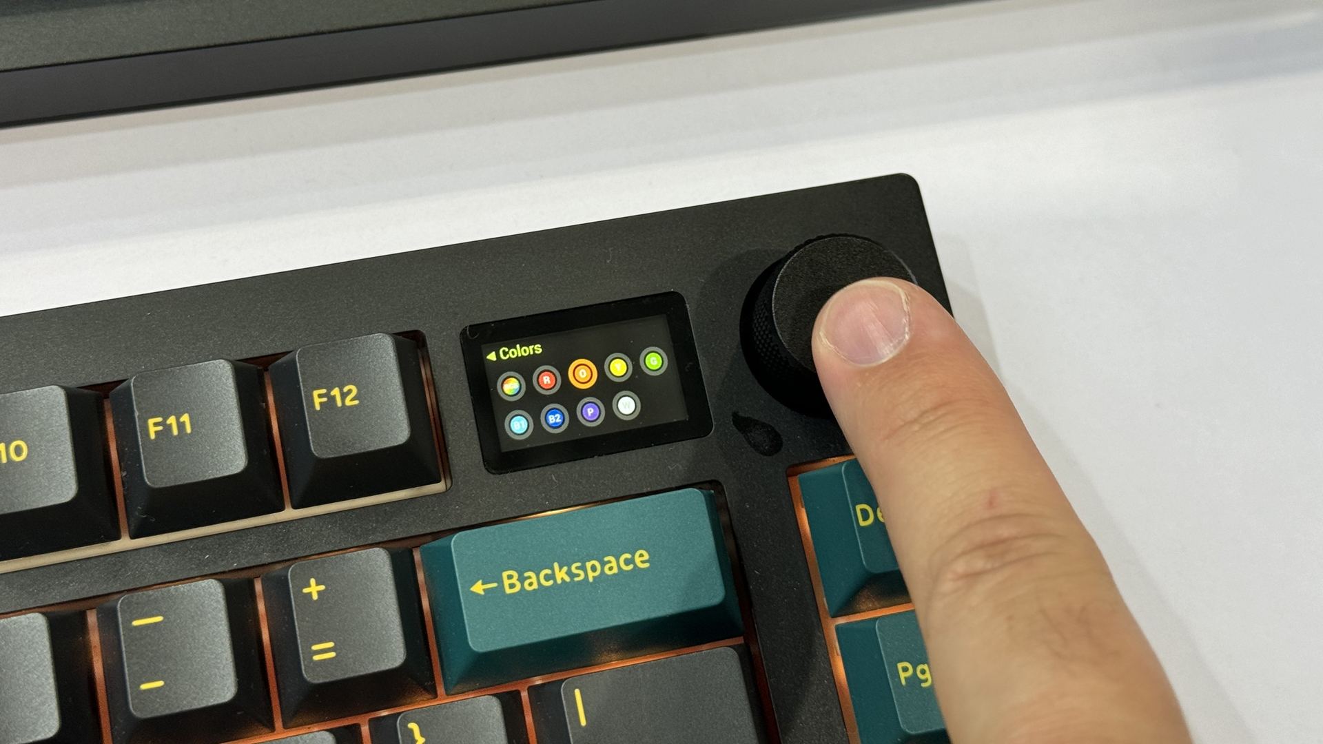 Touching the Mistel MD70 mechanical keyboard at Computex 2024.