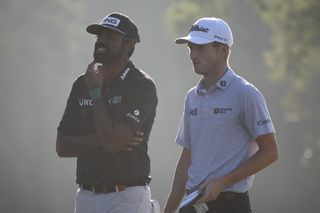 Sahith Theegala and Will Zalatoris watch on at the Zurich Classic
