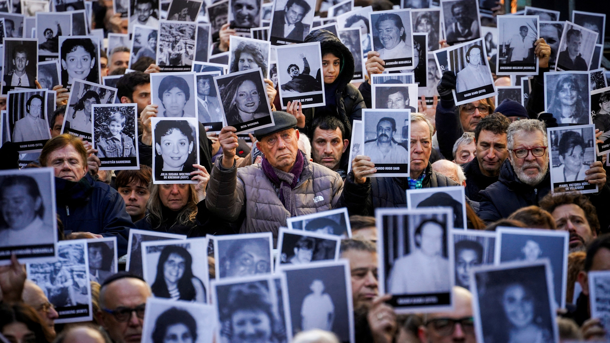 People holding photos
