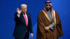 Donald Trump meets with MbS on stage at the US-Saudi Investment Forum in 2025