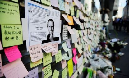 A San Francisco Apple storefront is covered in condolence notes: The global response to Steve Jobs' death is rustling up some backlash.