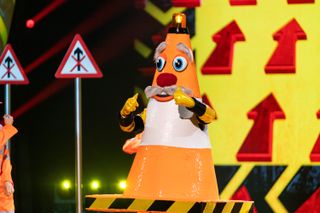 TV tonight - Who is hiding behind the Traffic Cone costume?