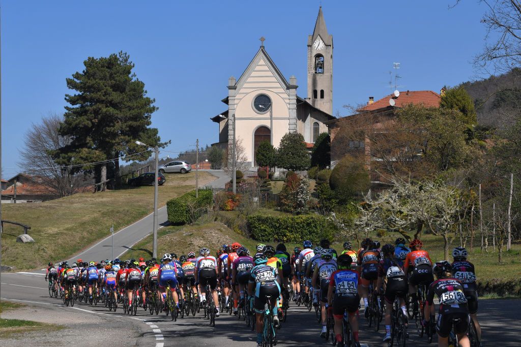 The peloton takes on a short climb