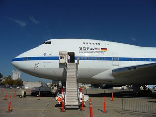 A view up the steps of NASA's SOFIA flying observatory. The modified 747SP jet bears the name "Clipper Lindbergh." SOFIA just started flying science missions last year, and astronomers hope to operate it for at least two decades.