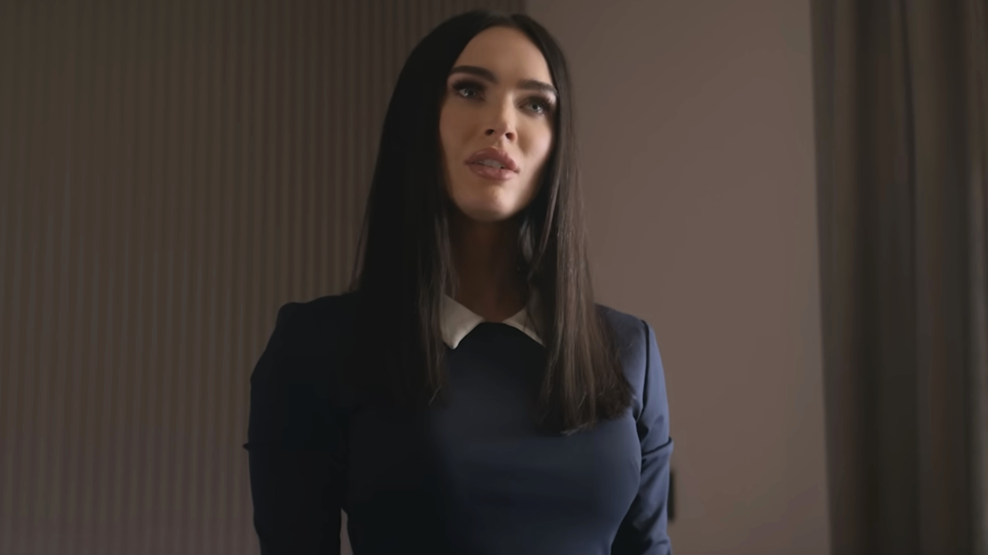 Alice (Megan Fox) takes on instructions in Subservience.