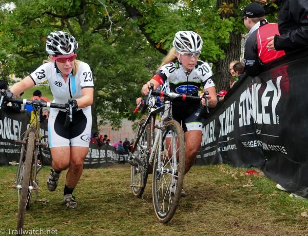 Mountain bikers Chloe Forsman (L) on the run-up with Emily Batty
