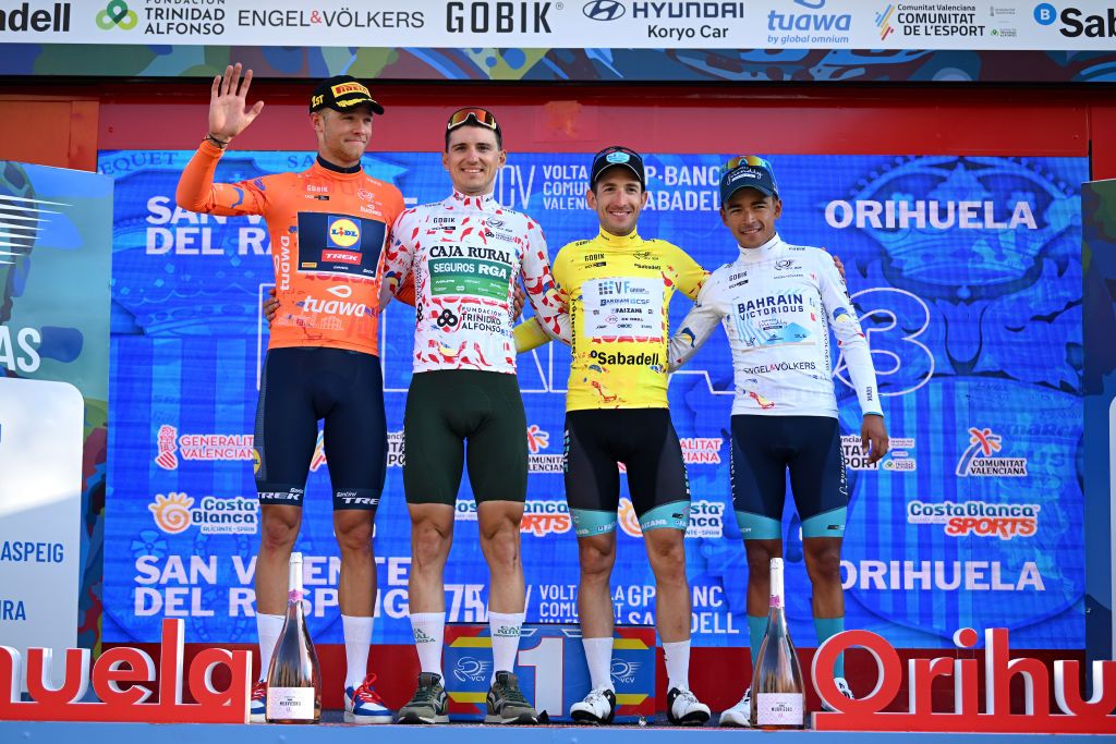 ORIHUELA SPAIN FEBRUARY 02 LR Jonathan Milan of Italy and Team Lidl Trek Orange Points Jersey Gorka Sorarrain of Spain and Team Caja RuralRGA Polka dot Mountain Jersey Alessandro Tonelli of Italy and Team VF GroupBardiani CSF Yellow Leader Jersey and Santiago Buitrago of Colombia and Team BahrainVictorious White Best Young Jersey pose on the podium ceremony after the 75th Volta a la Comunitat Valenciana 2024 Stage 3 a 1613km stage from San Vicente del Raspeig to Orihuela on February 02 2024 in Orihuela Spain Photo by Dario BelingheriGetty Images