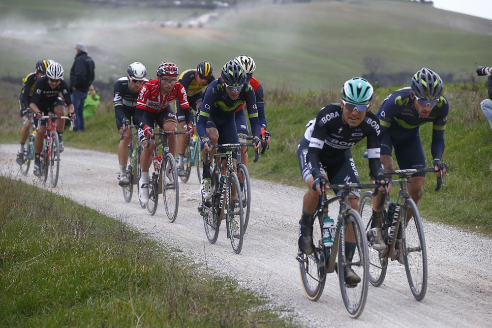 Riders struggle along the route of Strade Bianche