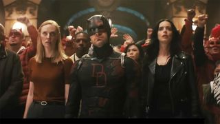 Karen Page, Daredevil, and Jessica Jones standing in front of a crowd in Daredevil: Born Again season 2