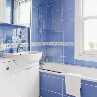 family bathroom with blue tiles