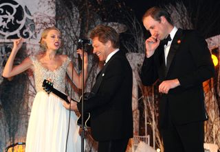 Taylor Swift, Jon Bon Jovi and Prince William, Duke of Cambridge perform during the Winter Whites Gala In Aid Of Centrepoint on November 26