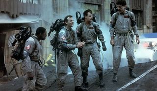 Ghostbusters Ernie Hudson Bill Murray Dan Aykroyd Harold Ramis planning attack on a ruined street