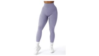 A model from the waist down wearing light purple ribbed leggings, for the best leggings on Amazon.