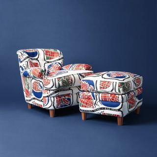 Svenskt Tenn jubilee pattern on armchair and ottoman