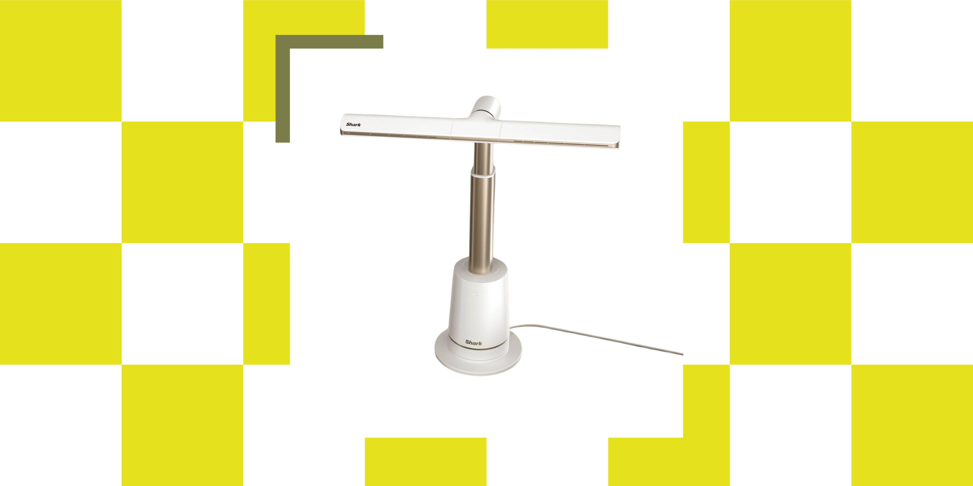 Image of a white, bladeless fan with a cord on a yellow and white checkerboard background.