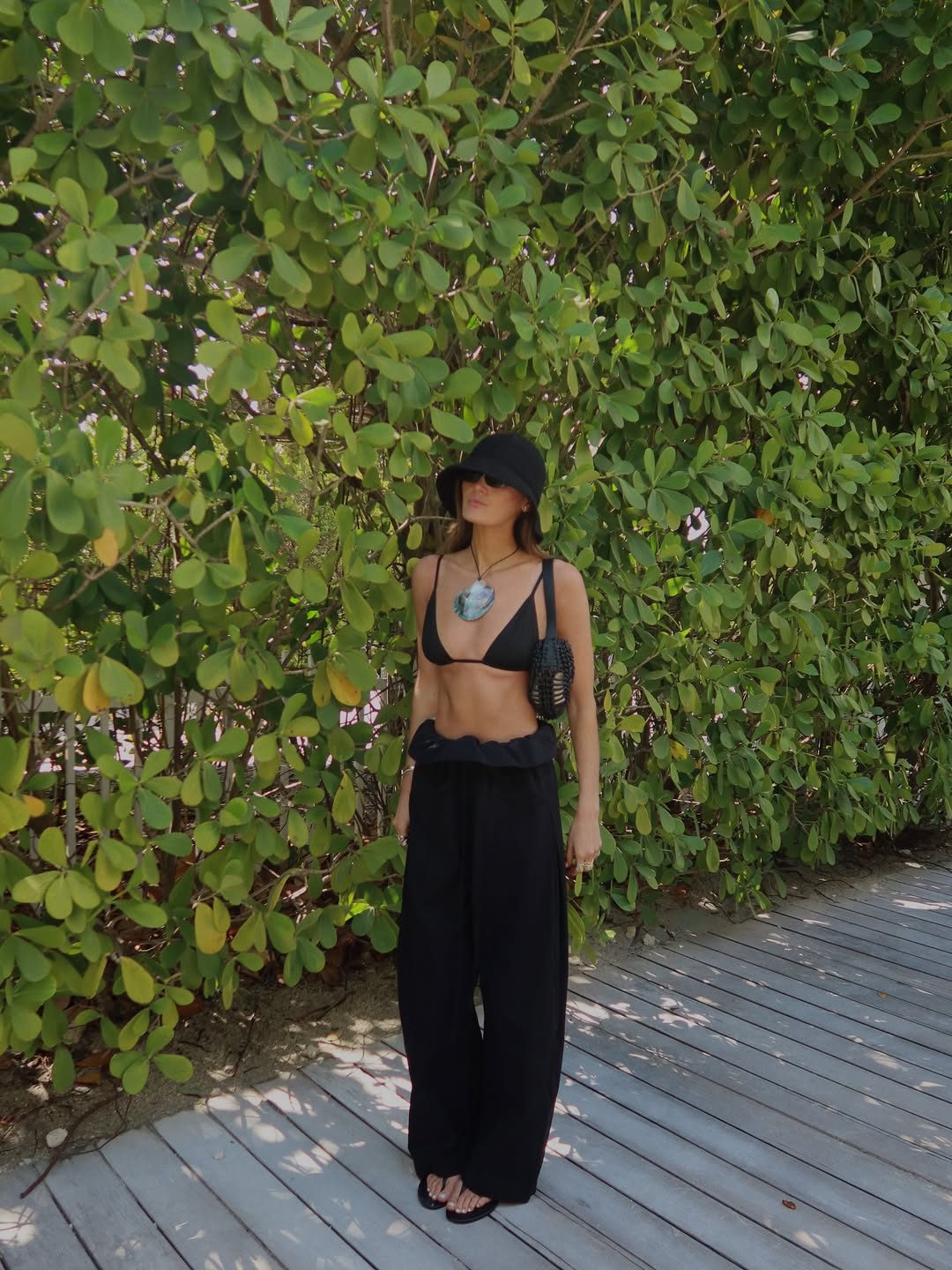 Coco in black foldover trousers