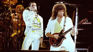 Brian MAY and Freddie MERCURY and QUEEN, L-R: Freddie Mercury and Brian May performing live on stage 