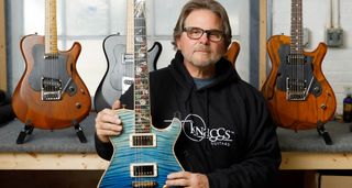 Joe Knaggs of Knaggs Guitars with the "Reef of Life" Kenai