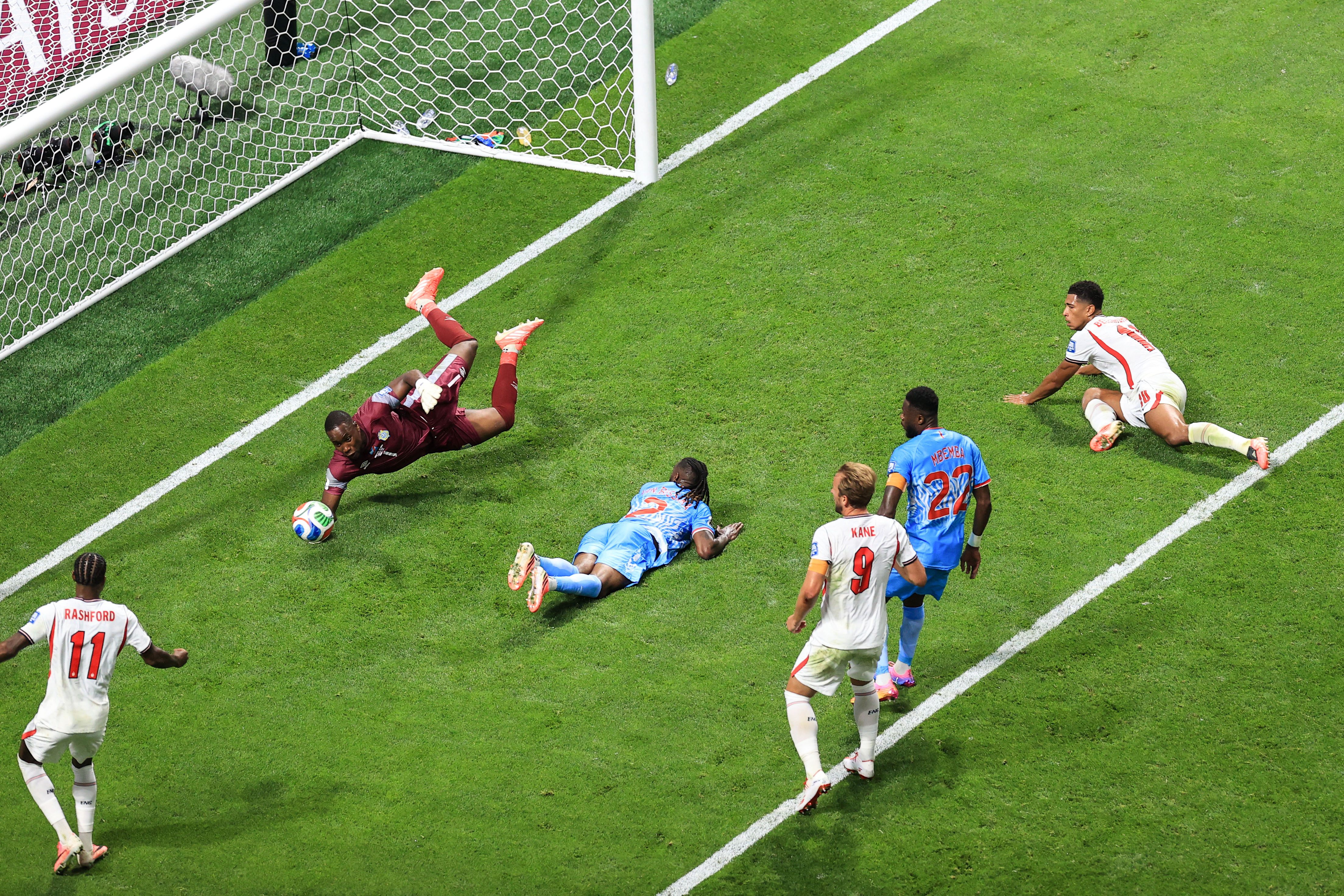 Lionel Mpasi Nzau making a diving save.