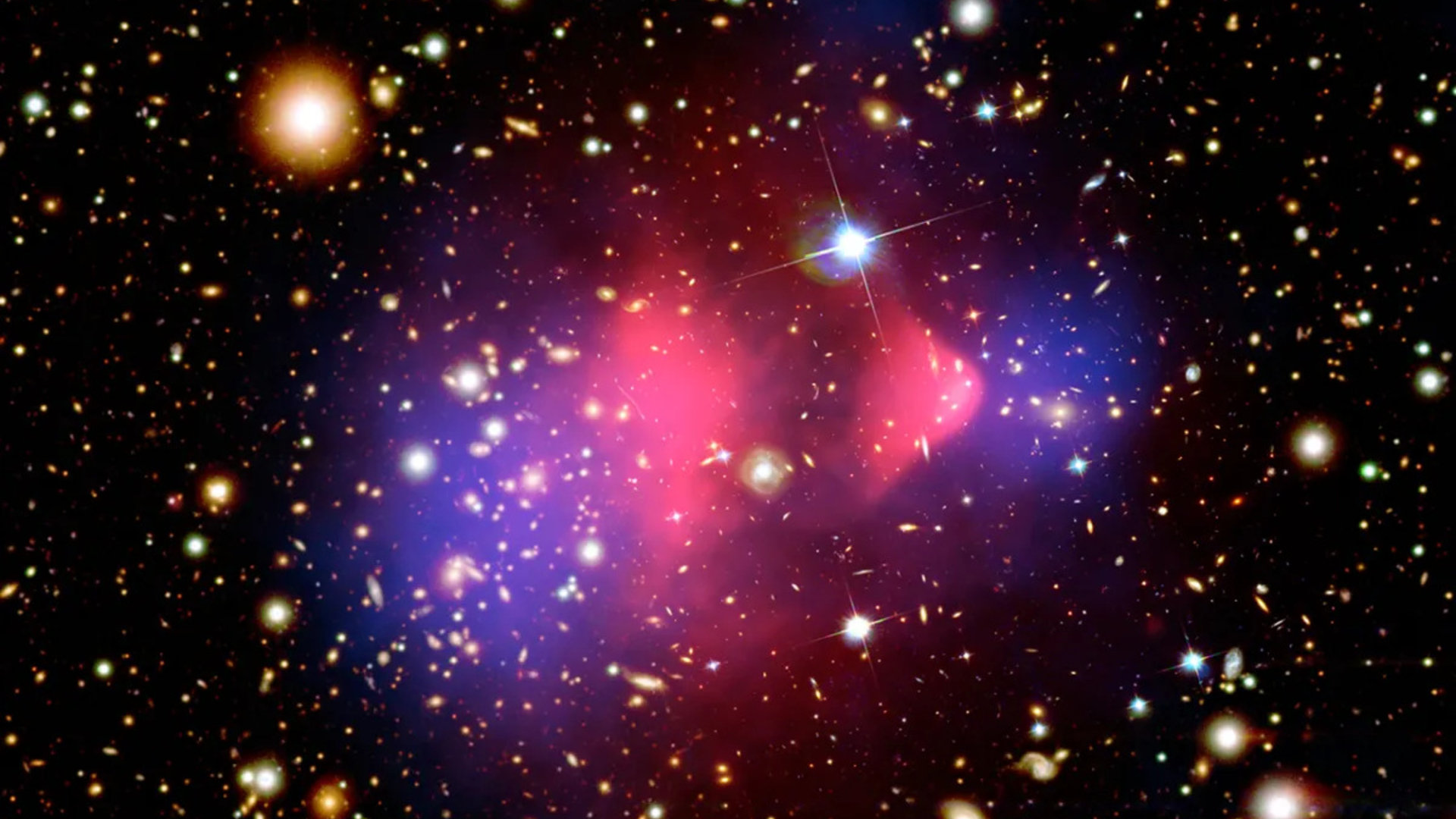 A series of blue and red blurs of light swirl around stars in a deep space image