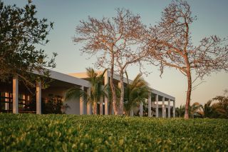 Brandílera House in mexico, a home built around a colonnade and set among green nature