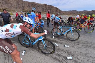 Water crossing causes mass pile-up in Tour of Oman