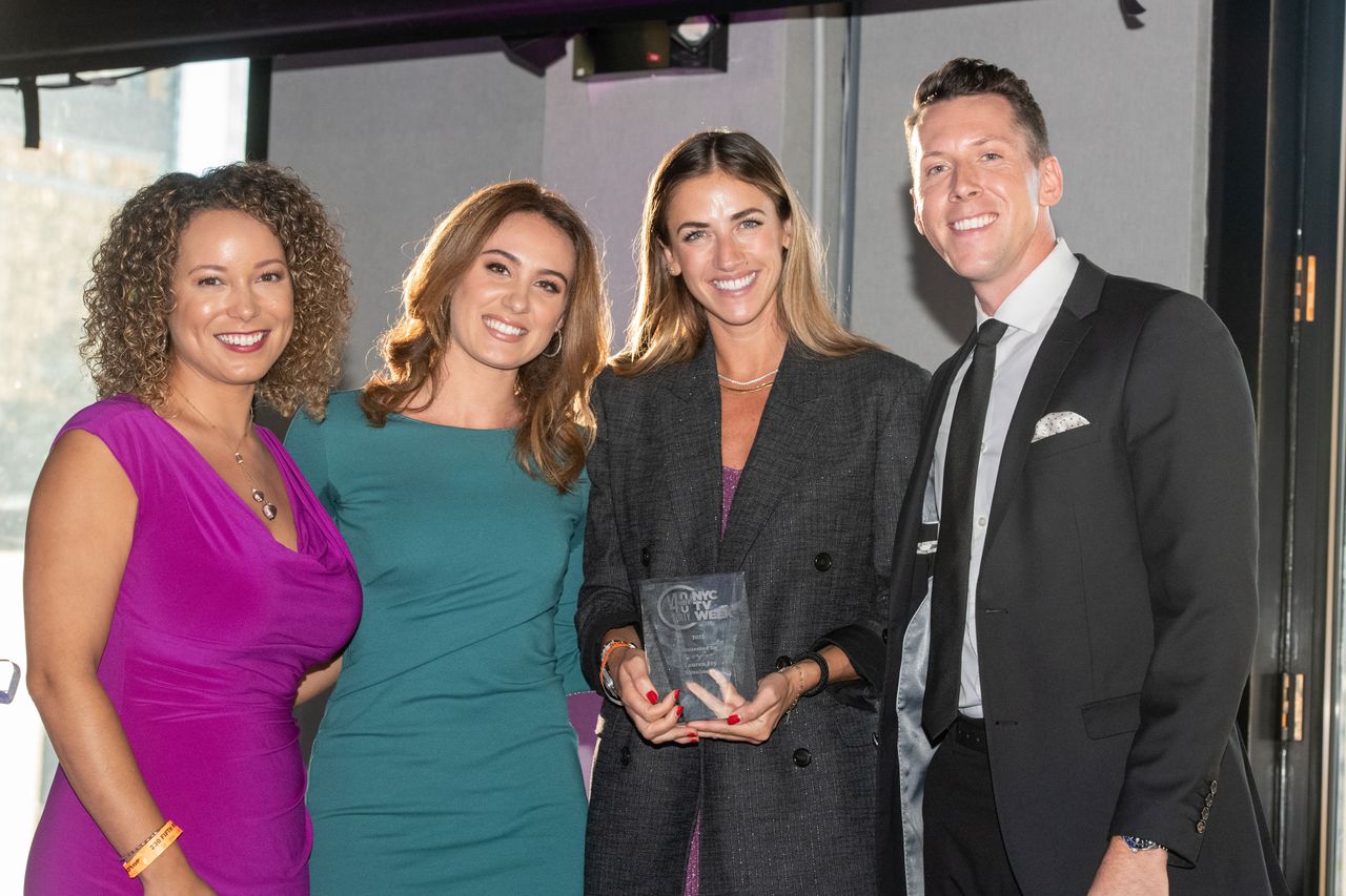 Simulmedia chief revenue officer Lauren Fry with the event hosts.
