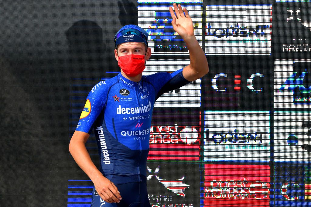 PLOUAY FRANCE AUGUST 29 Mikkel Honor of Denmark and Team Deceuninck QuickStep celebrates winning the third place on the podium ceremony after the 85th Bretagne Classic OuestFrance 2021 a 251km race from Plouay to Plouay OuestFrance on August 29 2021 in Plouay France Photo by Luc ClaessenGetty Images