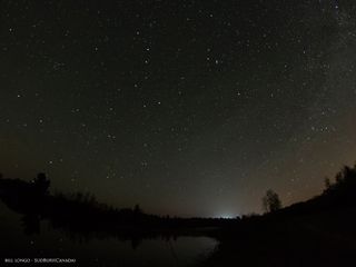 Stargazer Bill Longo captured this small meteor (top center) during the Camelopardalid meteor shower spawned by Comet 209P/LINEAR on May 24, 2014 as seen from Sudbury in Canada.