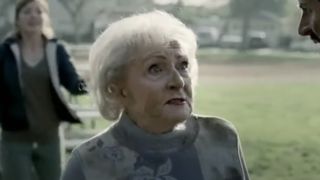 Betty White covered in mud on football field in Snickers ad