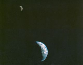 This picture of Earth and the moon in a single frame — the first of its kind ever taken by a spacecraft — was recorded Sept. 18, 1977, by NASAs Voyager 1 spacecraft at a distance of 7.25 million miles (11.7 million km) from Earth. Because Earth is many times brighter than the moon, the moon was artificially brightened by a factor of three relative to the Earth by computer enhancement so that both bodies would show clearly in the prints.