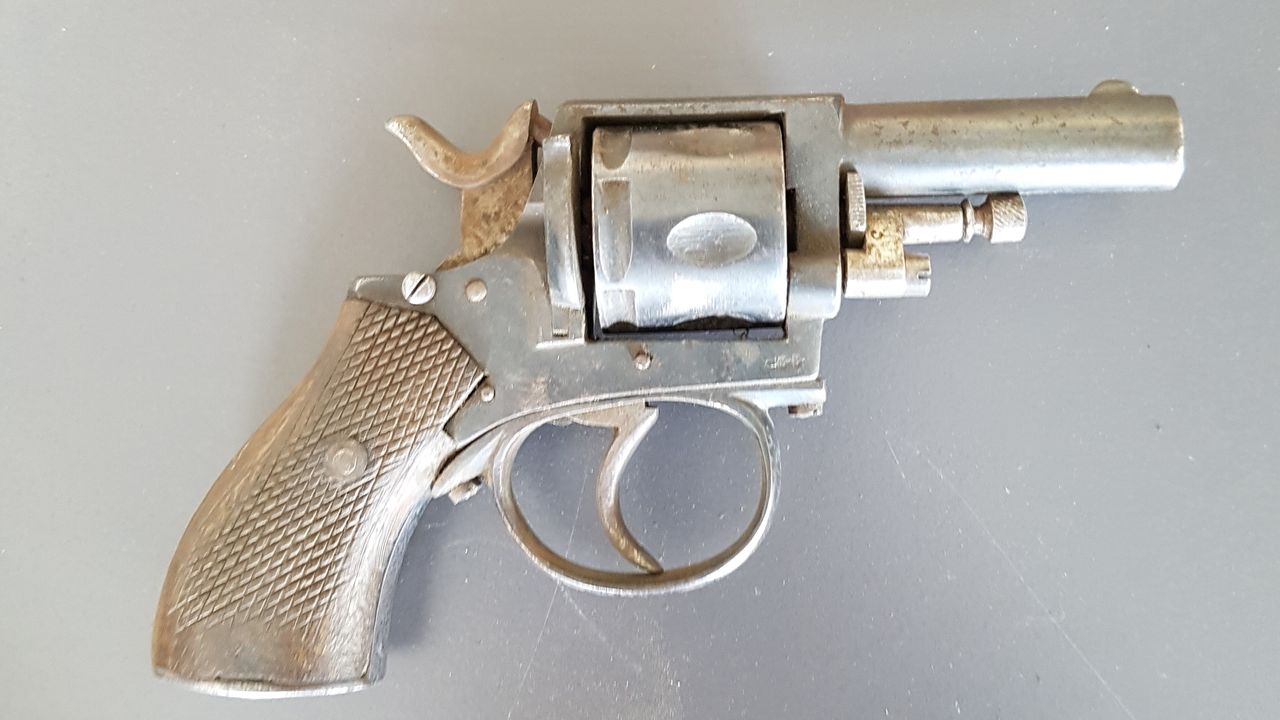 A revolver was found among the weapons in the cache; it's probably a relic of street battles by the Nazi paramilitary Stormtroopers.