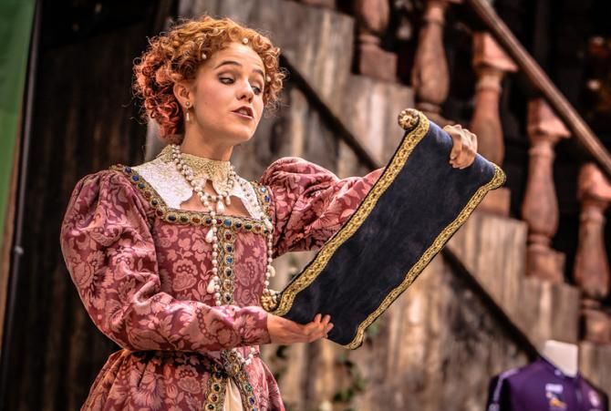 An actress from the Southern University Shakespeare Theater read a decree from the governor of Utah.