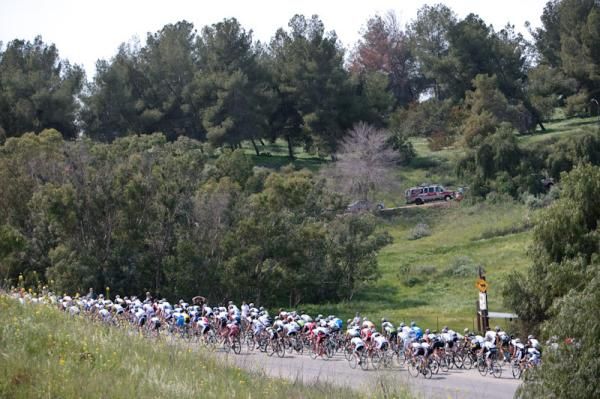 The men on the way out of the feed zone and into the park.