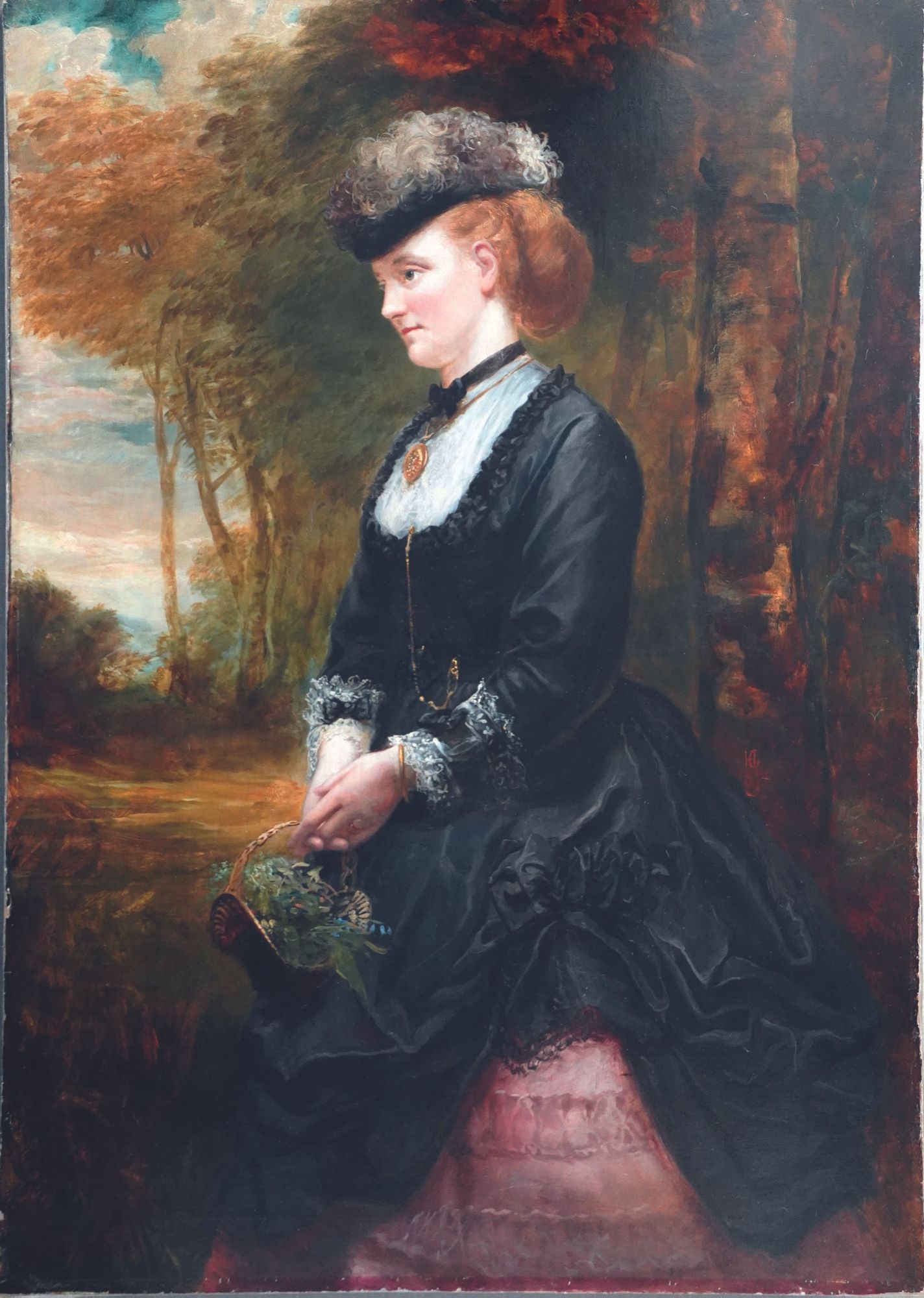 A restored portrait of a Victorian woman in a dress.
