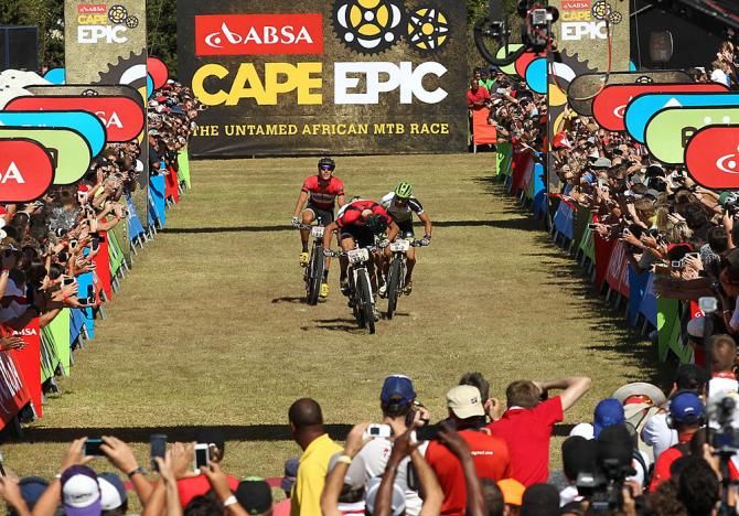 Philip Buys of Scott Factory Racing, Jose Hermida, Rudi van Houts of Multivan Merida and Matthys Beukes of Scott Factory Racing sprint for the line for stage honors