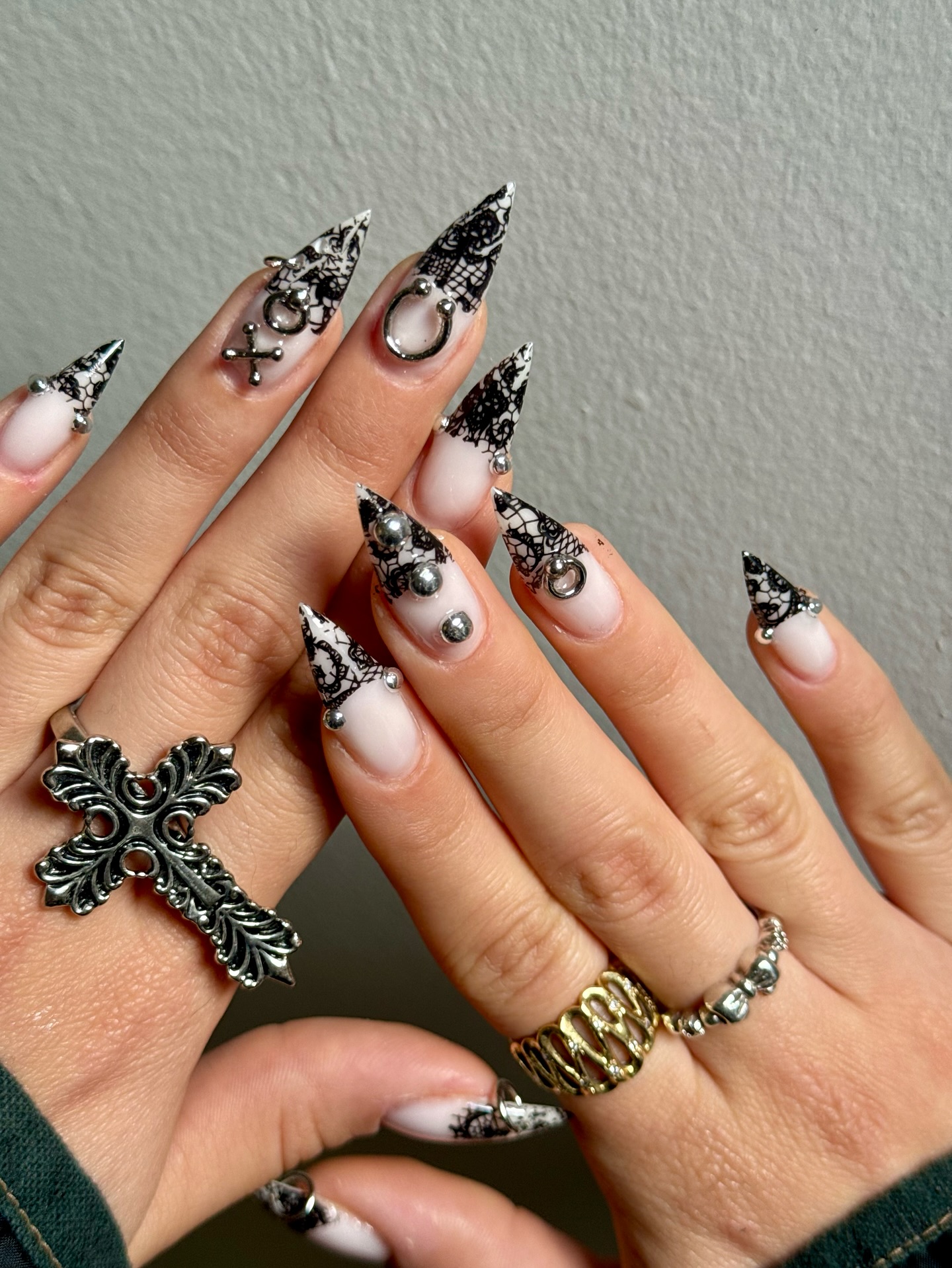 Black lace tips and 3D detailing nail art design