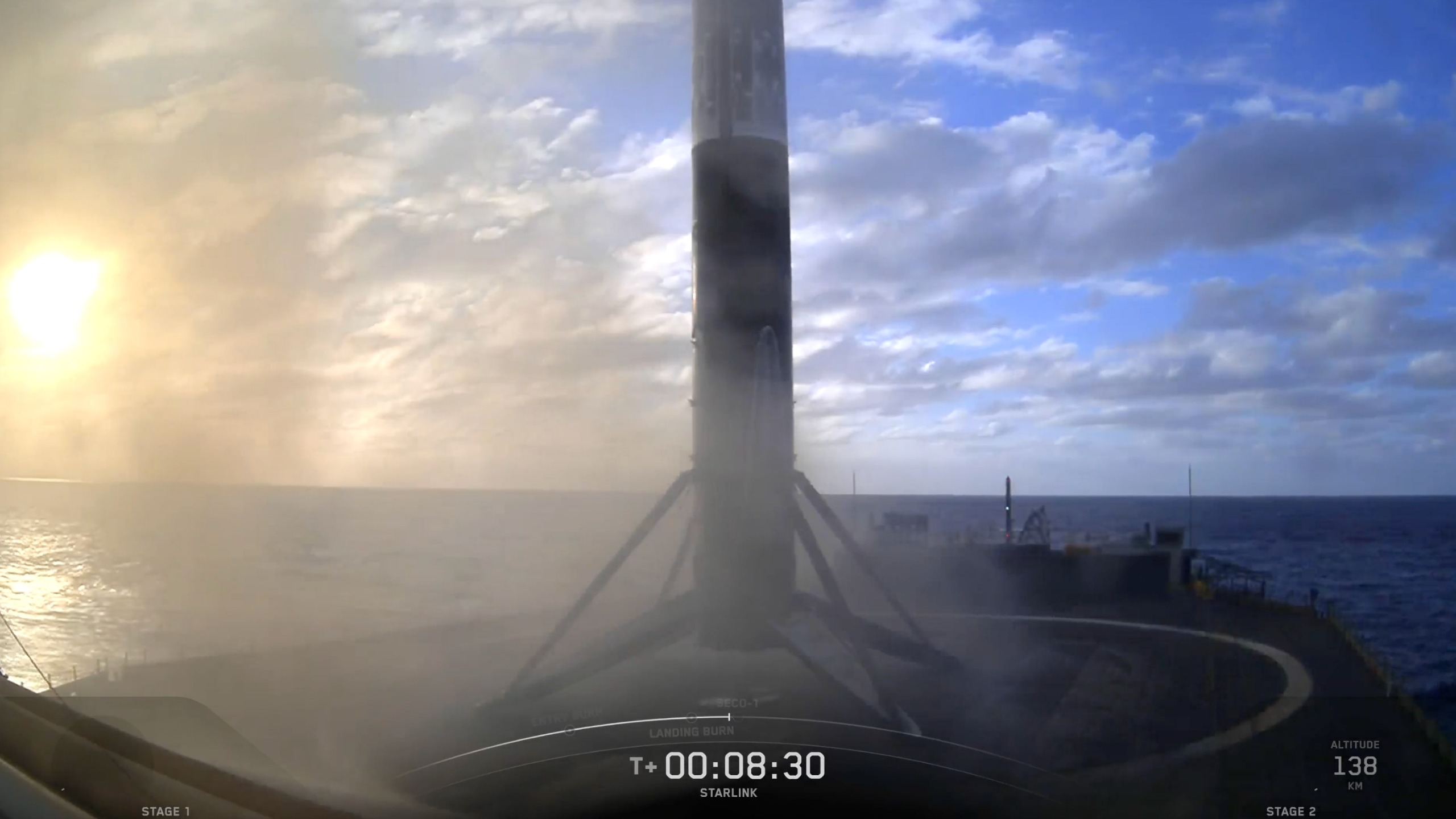 a rocket rests on the deck of a ship at sea