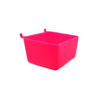 A small pink storage basket
