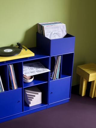 Blue Montana Spin vinyl storage with record player on top