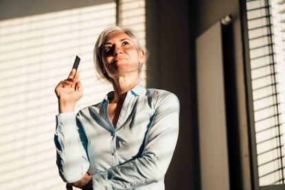 woman holding a credit card