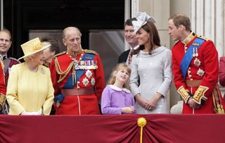 Queen Elizabeth II, Prince Philip, Duke of Edinburgh, Lady Louise Windsor, Catherine, Duchess of Cambridge and Prince William, Duke of Cambridge stand on the balcony of Buckingham Palace