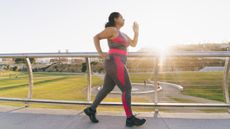 Woman in sportswear walking outside