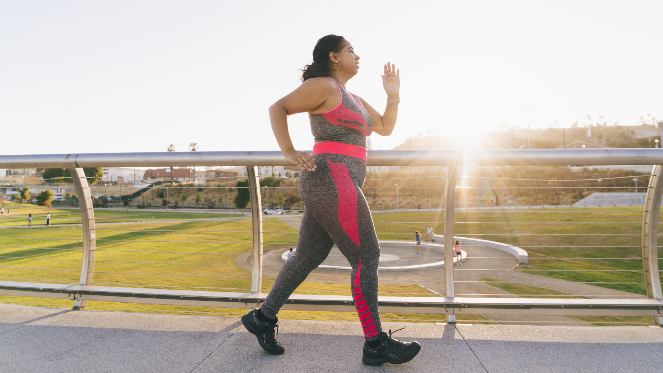 Woman in sportswear walking outside