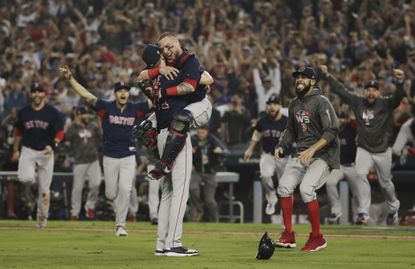 Boston Red Sox players celebrate their World Series win.