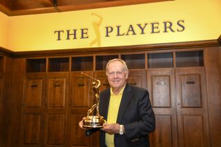 Jack Nicklaus holds The Players Championship trophy