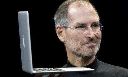 Steve Jobs shows off the MacBook Air: Sales of Apple computers continue to grow faster than PCs in the business market, despite their premium prices. 